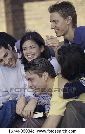 Side profile of a group of teenagers smiling View Large Photo Image Stock Image - Side profile of a group of teenagers smiling. Fotosearch