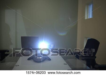 Slide projector and a conference phone in a conference room View Large Photo Image Stock Image - Slide projector and a conference phone in a conference room. Fotosearch