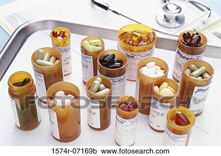 Stethoscope and vials of pills View Large Photo Image Stock Image - Stethoscope and vials of pills. Fotosearch
