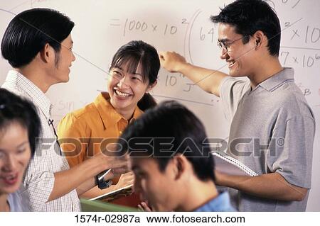 Teenage students in a classroom View Large Photo Image Stock Image - Teenage students in a classroom. Fotosearch