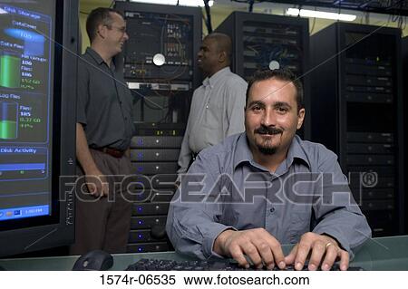 Three technicians in a server room View Large Photo Image Stock Photography - Three technicians in a server room. Fotosearch