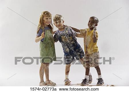 Two boys and a girl having a food fight View Large Photo Image Stock Image - Two boys and a girl having a food fight. Fotosearch