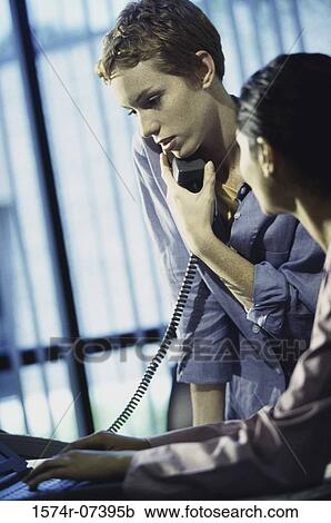 Two businesswomen in an office View Large Photo Image Stock Image - Two businesswomen in an office. Fotosearch