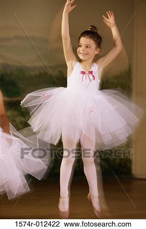 Ballerina dancing with her arms raised View Large Photo Image Stock Image - Ballerina dancing with her arms raised. Fotosearch