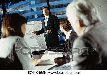 Business executives in a meeting View Large Photo Image Stock Image - Business executives in a meeting. Fotosearch