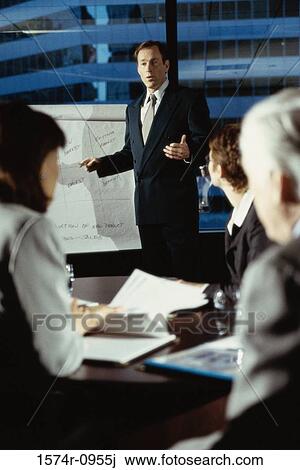 Business executives in a meeting View Large Photo Image Stock Image - Business executives in a meeting. Fotosearch