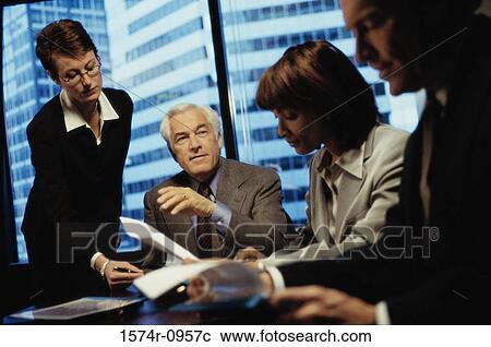Business executives in a meeting View Large Photo Image Stock Image - Business executives in a meeting. Fotosearch