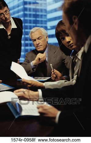 Business executives in a meeting View Large Photo Image Stock Image - Business executives in a meeting. Fotosearch