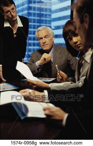 Business executives in a meeting View Large Photo Image Stock Image - Business executives in a meeting. Fotosearch