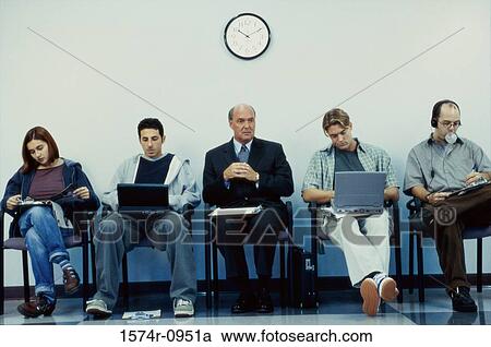 Business executives sitting in a row operating laptops View Large Photo Image Stock Image - Business executives sitting in a row operating laptops. Fotosearch