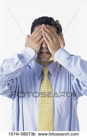 Businessman covering his eyes View Large Photo Image Stock Image - Businessman covering his eyes. Fotosearch