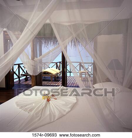 Canopy bed in a hotel room View Large Photo Image Stock Image - Canopy bed in a hotel room. Fotosearch