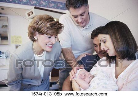 Close-up of a baby boy with his parents and grandparents in a hospital View Large Photo Image Stock Image - Close-up of a baby boy with his parents and grandparents in a hospital. Fotosearch