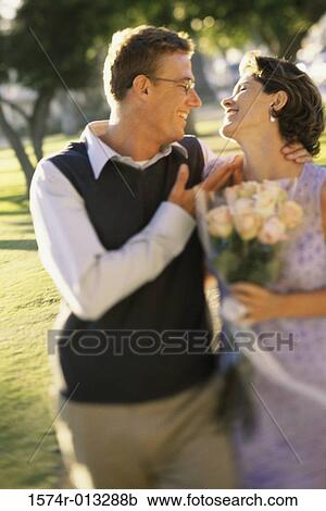 Stock Image - Close-up of a father playing with his daughter. Fotosearch