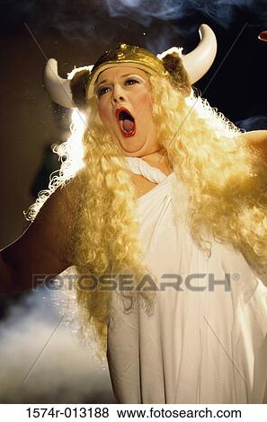 Close-up of a female opera singer singing View Large Photo Image Stock Photo - Close-up of a female opera singer singing. Fotosearch