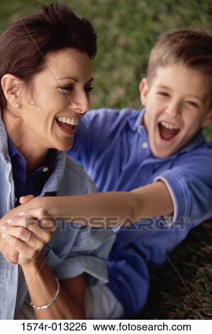 Stock Photograph - Close-up of a mother and son laughing. Fotosearch