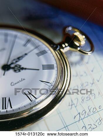 Stock Image - Close-up of a pocket watch. Fotosearch