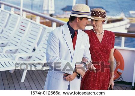 Close-up of a young couple looking at each other on a cruise ship View Large Photo Image Stock Image - Close-up of a young couple looking at each other on a cruise ship. Fotosearch