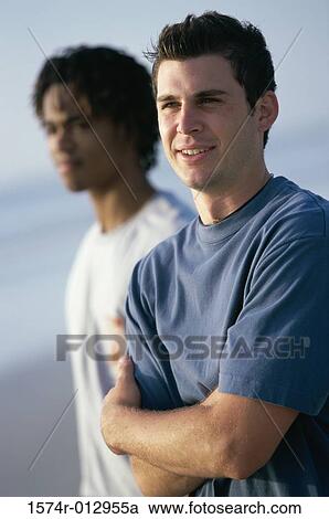 Stock Image - Close-up of a young man smiling. Fotosearch