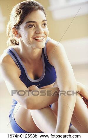 Stock Image - Close-up of a young woman smiling. Fotosearch