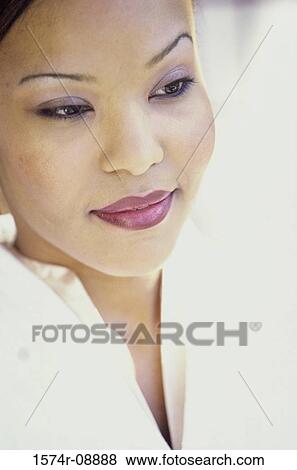 Stock Photo - Close-up of a young woman. Fotosearch