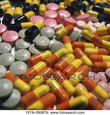Stock Image - Close-up of an assortment of capsules and tablets. Fotosearch