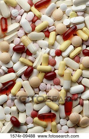 Stock Photo - Close-up of an assortment of capsules and tablets. Fotosearch