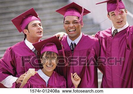 Stock Image - Close-up of four young graduates smiling. Fotosearch