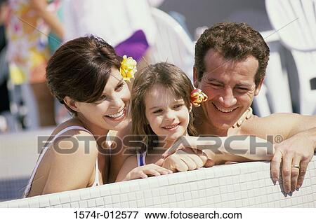 Close-up of parents with their daughter View Large Photo Image Stock Photo - Close-up of parents with their daughter. Fotosearch