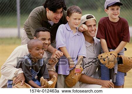 Close-up of three fathers with their sons wearing baseball gloves in a baseball field View Large Photo Image Stock Image - Close-up of three fathers with their sons wearing baseball gloves in a baseball field. Fotosearch