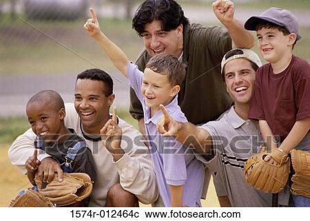 Close-up of three fathers with their sons wearing baseball gloves in a baseball field View Large Photo Image Stock Image - Close-up of three fathers with their sons wearing baseball gloves in a baseball field. Fotosearch