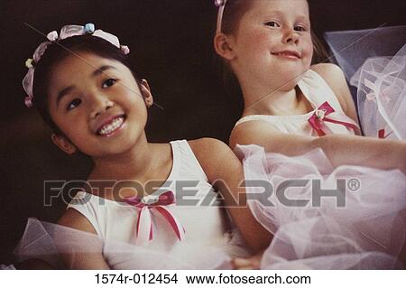 Close-up of two ballet dancers smiling View Large Photo Image Picture - Close-up of two ballet dancers smiling. Fotosearch