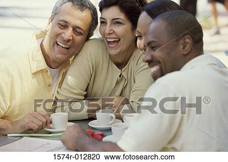 Close-up of two mature couples laughing View Large Photo Image Stock Image - Close-up of two mature couples laughing. Fotosearch