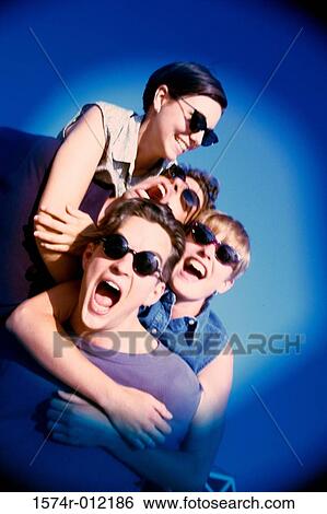 Close-up of two young couples shouting View Large Photo Image Stock Photograph - Close-up of two young couples shouting. Fotosearch