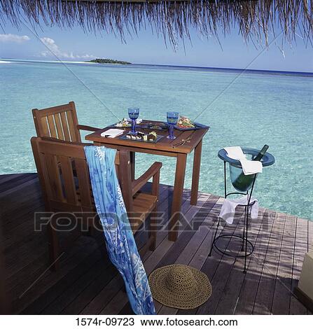 Food served on a table at the beach View Large Photo Image Stock Image - Food served on a table at the beach. Fotosearch