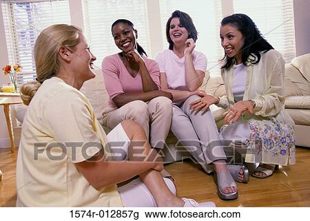 Four young women talking to each other View Large Photo Image Stock Image - Four young women talking to each other. Fotosearch