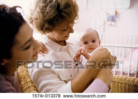 Grandmother with her daughter and granddaughter View Large Photo Image Stock Photo - Grandmother with her daughter and granddaughter. Fotosearch