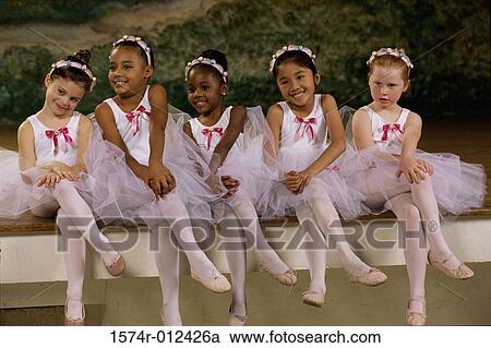 Group of ballet dancers sitting together View Large Photo Image Stock Image - Group of ballet dancers sitting together. Fotosearch