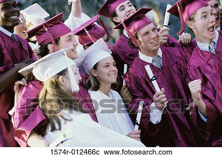 Group of teenage graduates celebrating View Large Photo Image Stock Image - Group of teenage graduates celebrating. Fotosearch