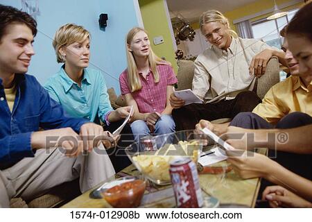 Group of teenagers playing a game View Large Photo Image Stock Image - Group of teenagers playing a game. Fotosearch