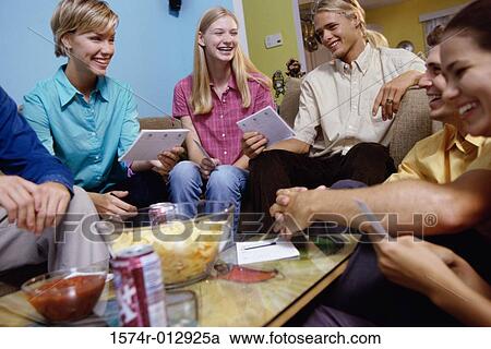 Group of teenagers playing a game View Large Photo Image Stock Image - Group of teenagers playing a game. Fotosearch