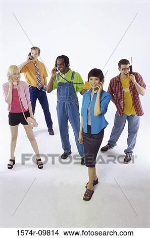 Picture - Group of young people talking on telephones. Fotosearch