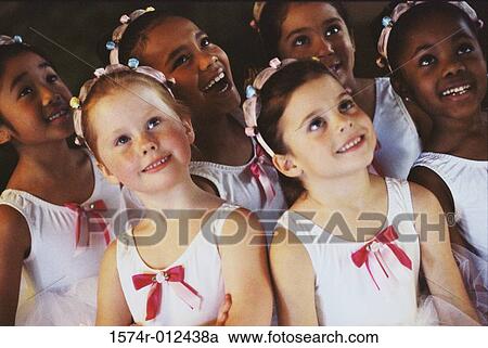 High angle view of a group of ballet dancers smiling View Large Photo Image Stock Image - High angle view of a group of ballet dancers smiling. Fotosearch
