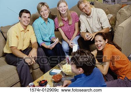 Stock Image - High angle view of a group of teenagers smiling. Fotosearch