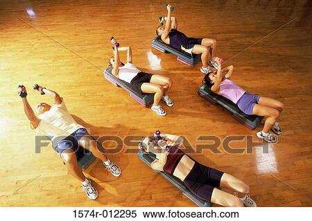 High angle view of five people exercising in a step aerobics class View Large Photo Image Stock Photography - High angle view of five people exercising in a step aerobics class. Fotosearch