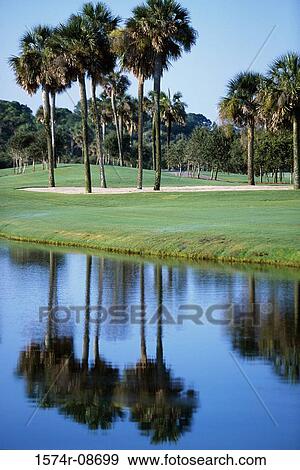 Stock Photo - Lake at a golf course. Fotosearch