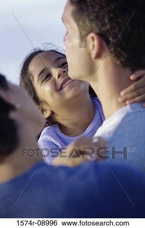 Mother and father with their daughter View Large Photo Image Stock Photograph - Mother and father with their daughter. Fotosearch