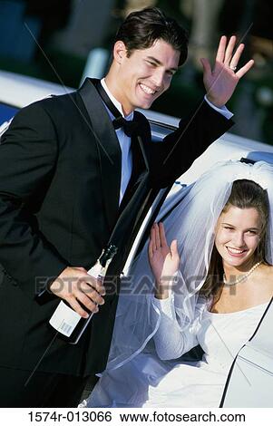 Newlywed couple waving their hands View Large Photo Image Stock Photograph - Newlywed couple waving their hands. Fotosearch