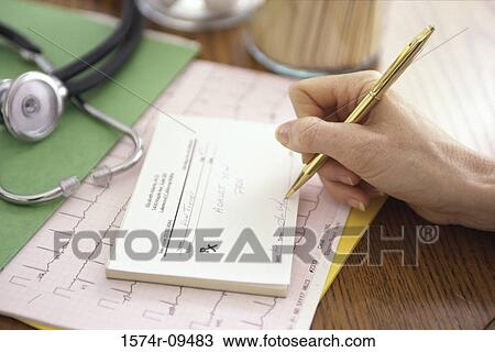 Person's hand writing a prescription View Large Photo Image Stock Image - Person's hand writing a prescription. Fotosearch