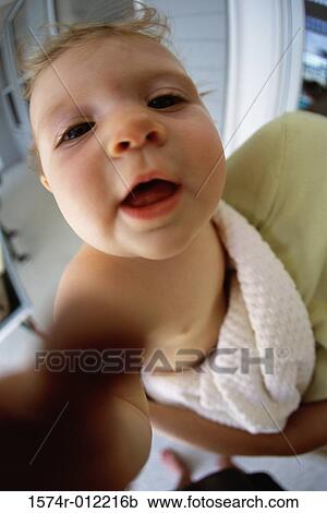 Portrait of a baby boy with his mouth open View Large Photo Image Stock Image - Portrait of a baby boy with his mouth open. Fotosearch